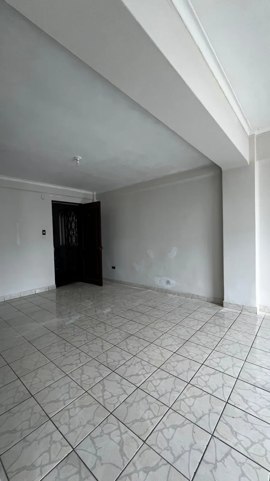 Sala e ingreso al departamento